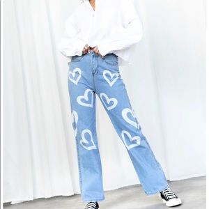 Jeans by 8birdies with white hearts on them